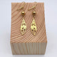 Boucles d'oreilles | Grandes plumes dorées